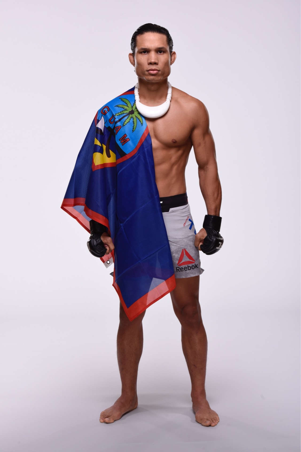 Sensei Jon Tuck with the Guam flag